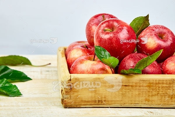 عکس تبلیغاتی سیب قرمز