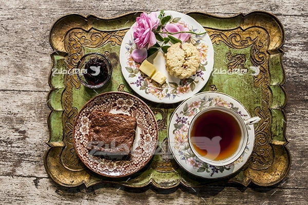 عکس چای و شیرینی و گل
