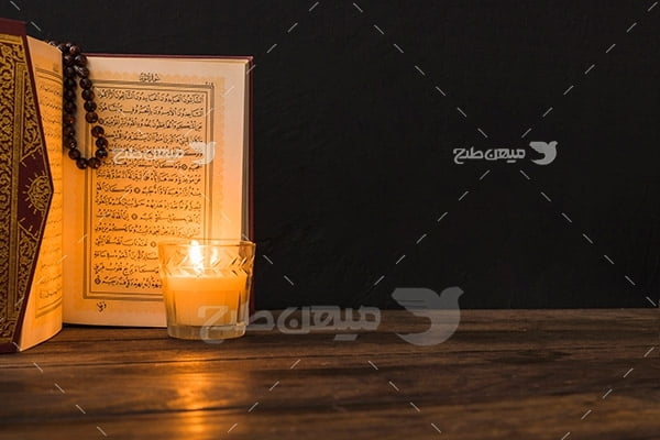﻿عکس قرآن و شمع