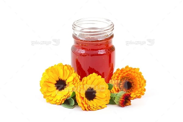 عکس شیشه عسل و گل