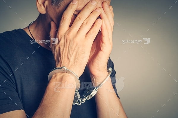 عکس دستبند و زندانی